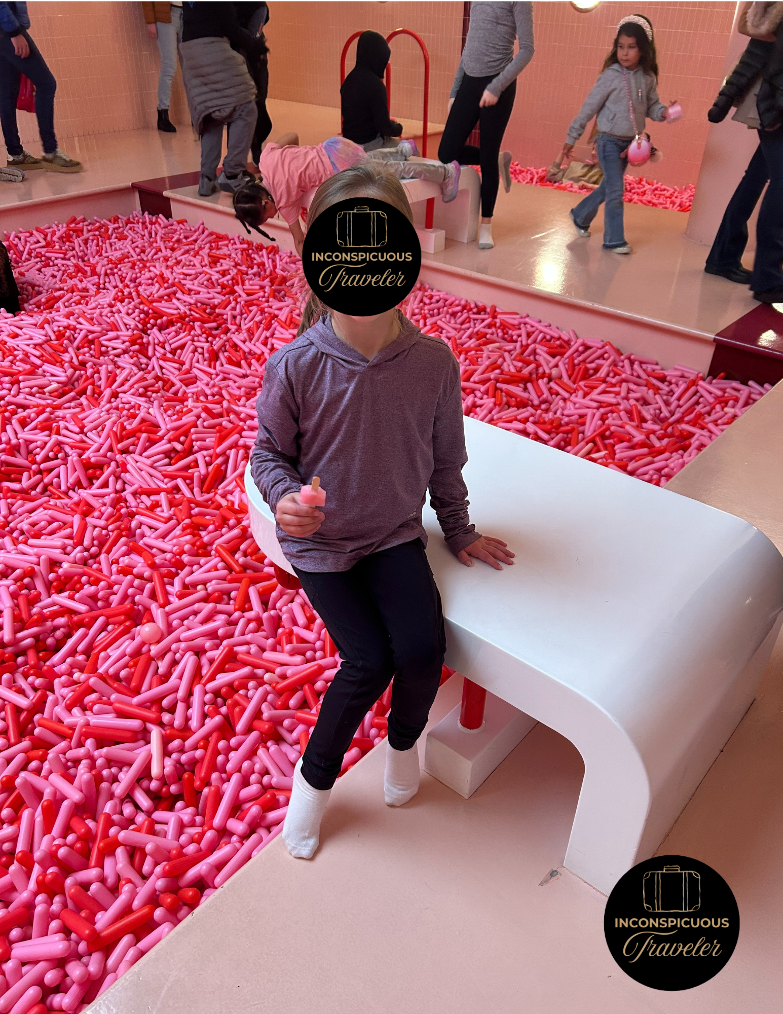 Little girl pauses for a quick photo at the Museum of Ice Cream